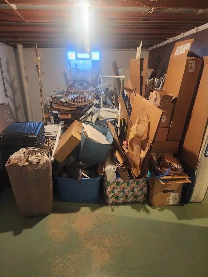 Roll-off dumpster container at job site for Construction Dumpster Rental in Tyngsborough